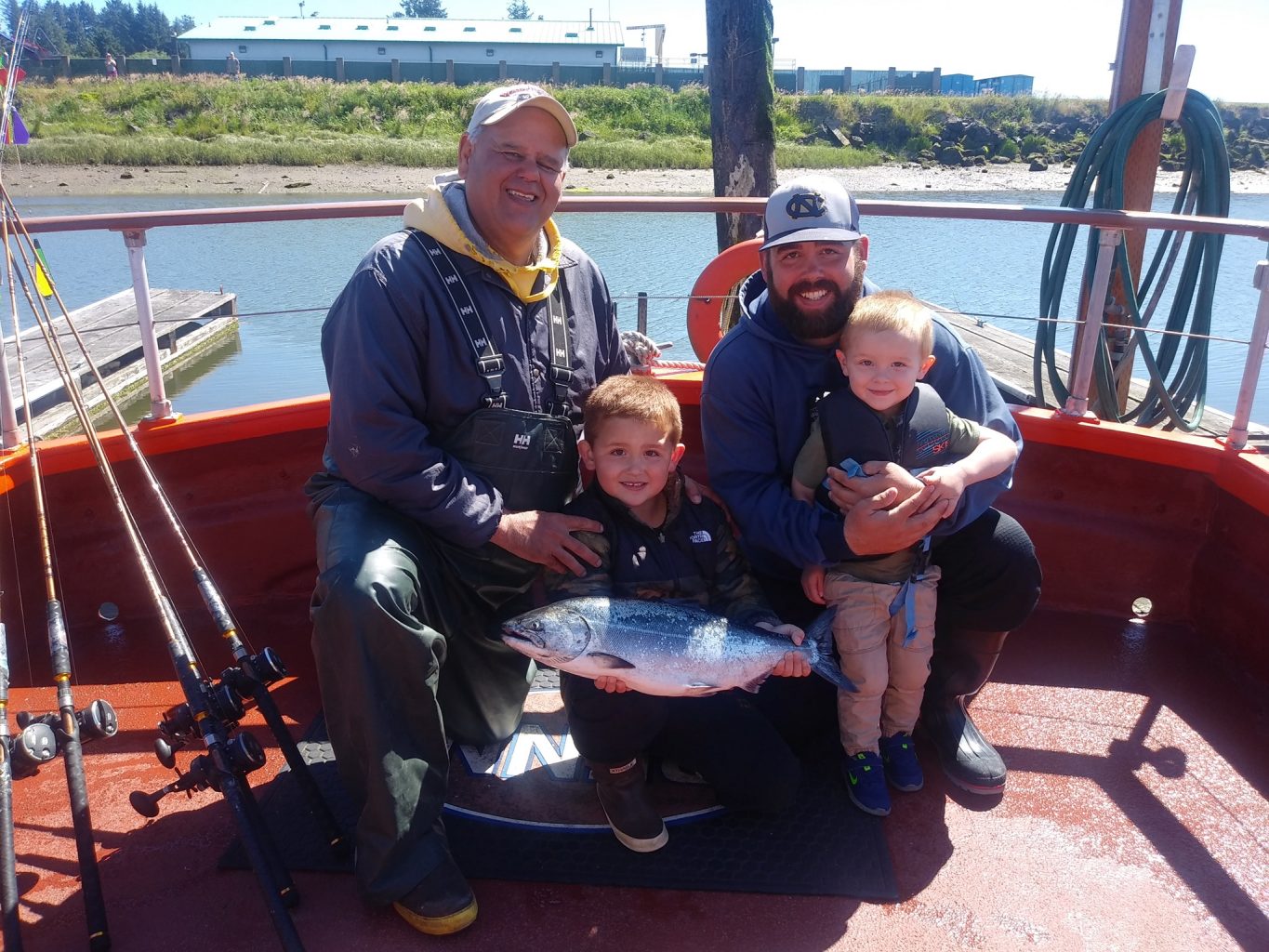 A family on a fishing boat